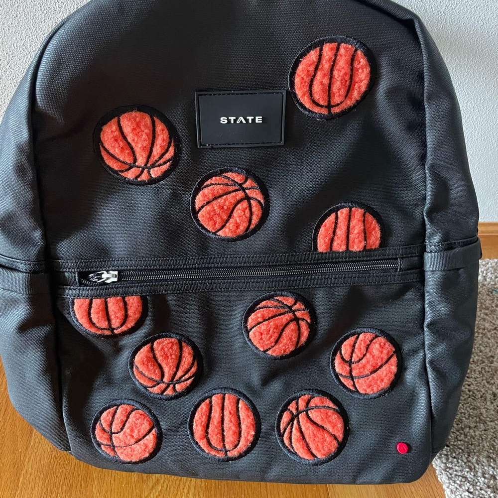 NEW STATE Black Backpack with Vibrant Basketball Pattern. Double pocket.